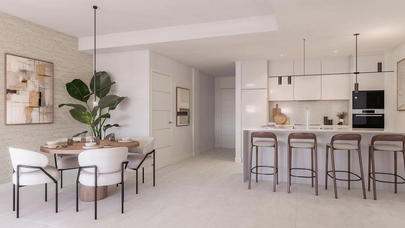 Modernt öppet kök och matplats med elegant design och ljusa färger.